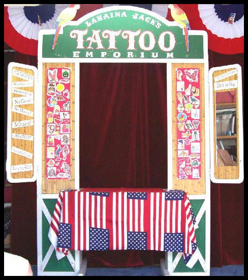 The Booth itself is inspired by the Old-fashioned storefronts of Lahaina Town. It sets up nearly 8 ft. high and includes a selection of over 200 (water-applied) tattoos. There's something for everyone. Cartoon Characters, Dinosaurs, Flowers, Contemporary "Tribal" Tattoos, and lots more. They peel off easily with masking tape or baby oil. A Guaranteed Hit!